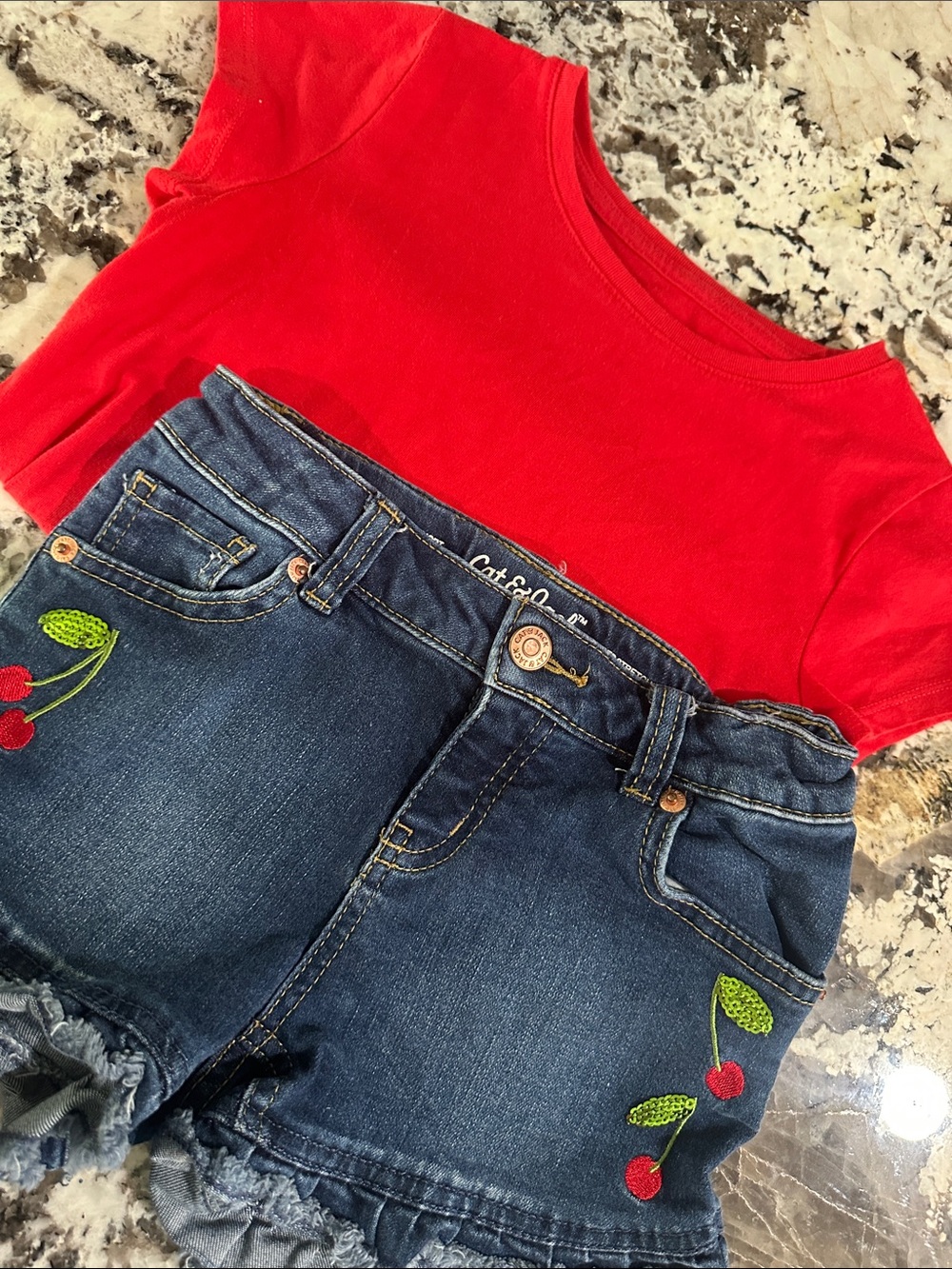 Denim Cherry Patch Ruffle Shorts and red top